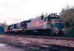 Seaboard Coast Line GP38-2 #558 leads 329's extra south by the former site of the depot 